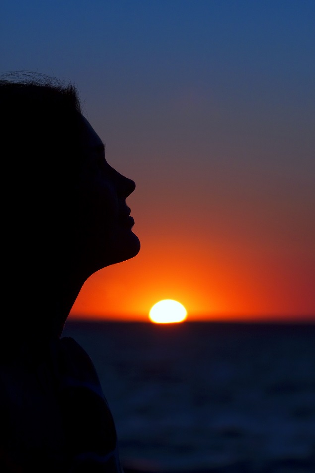 Woman quiet at sunset